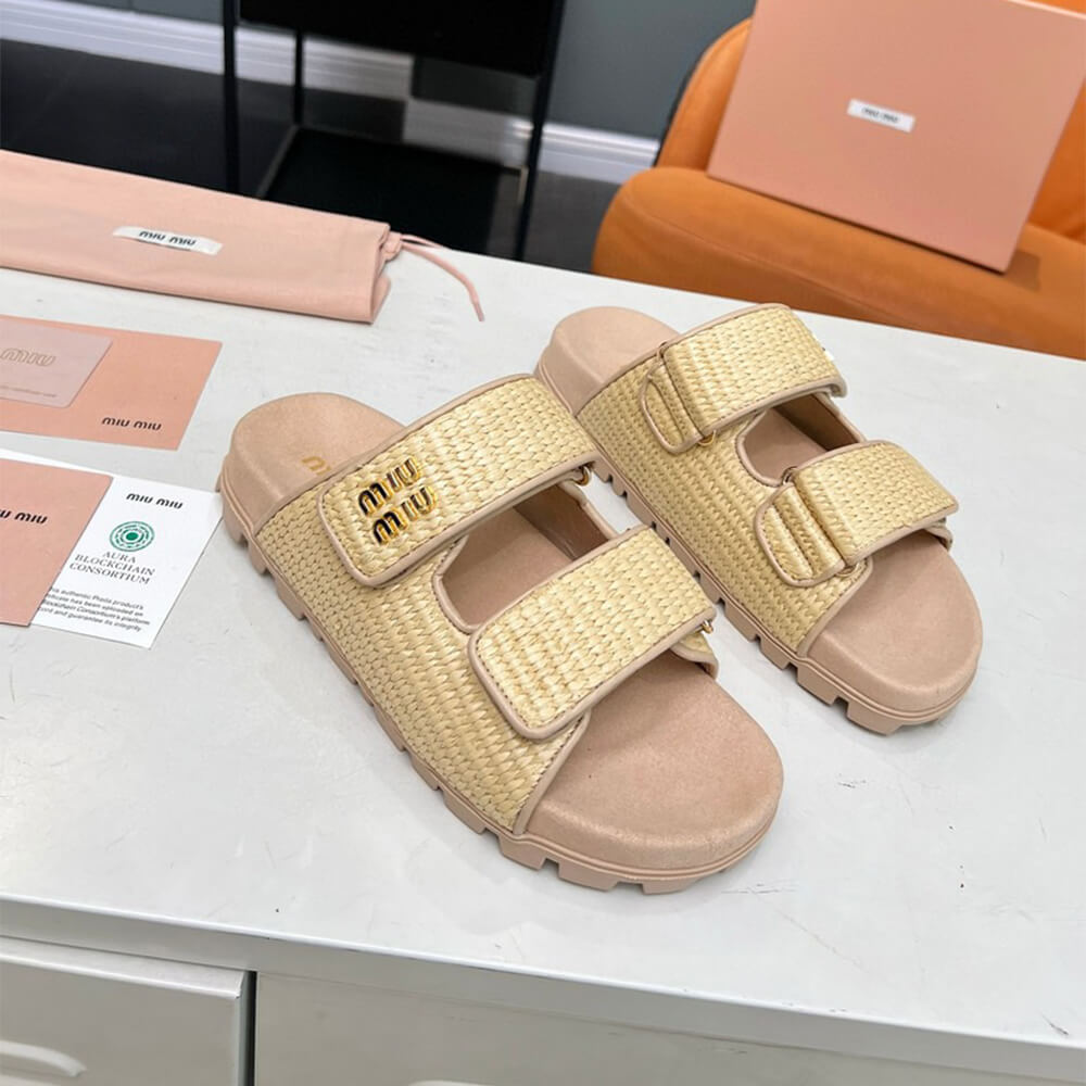 MiuMiu Raffia-effect woven fabric slides
